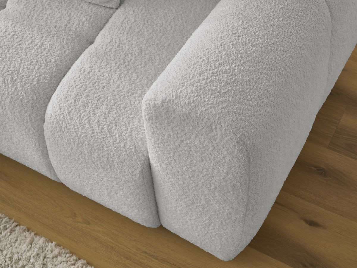 Canapé d'angle convertible coffre ROXELANE tissu bouclette avec pouf