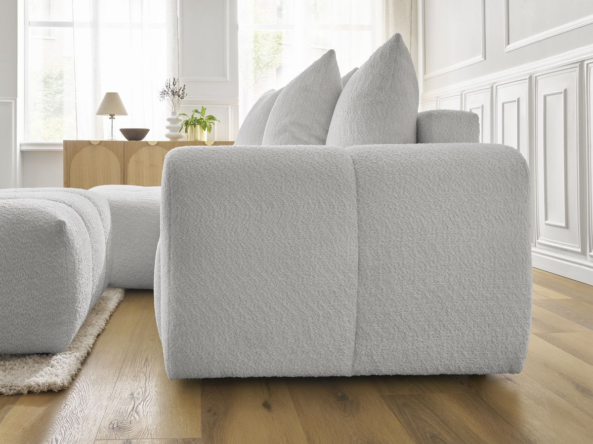 Canapé d'angle convertible coffre ROXELANE tissu bouclette avec pouf