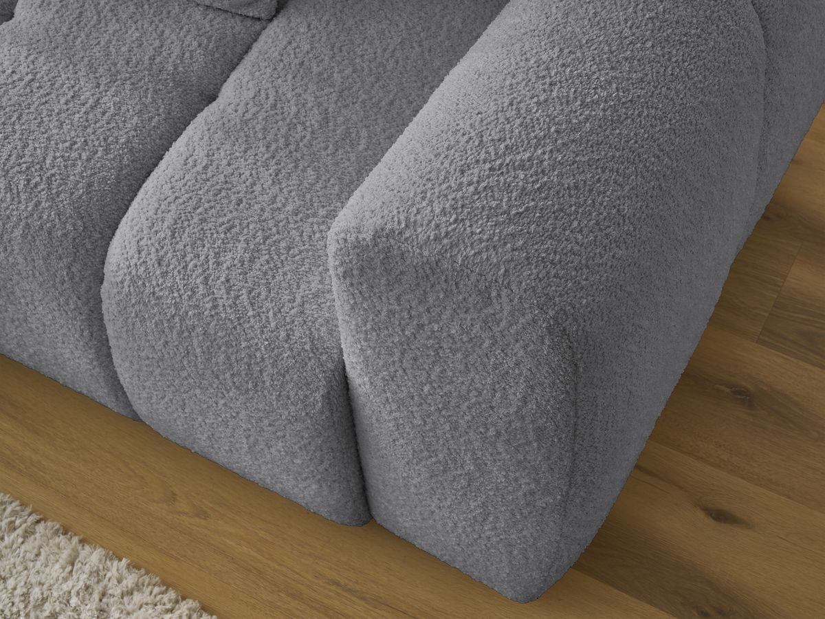 Canapé d'angle convertible coffre ROXELANE tissu bouclette avec pouf