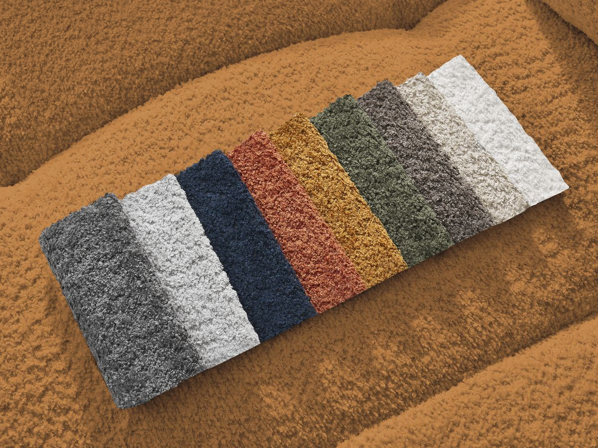 Canapé d'angle convertible coffre ROXELANE tissu bouclette avec pouf