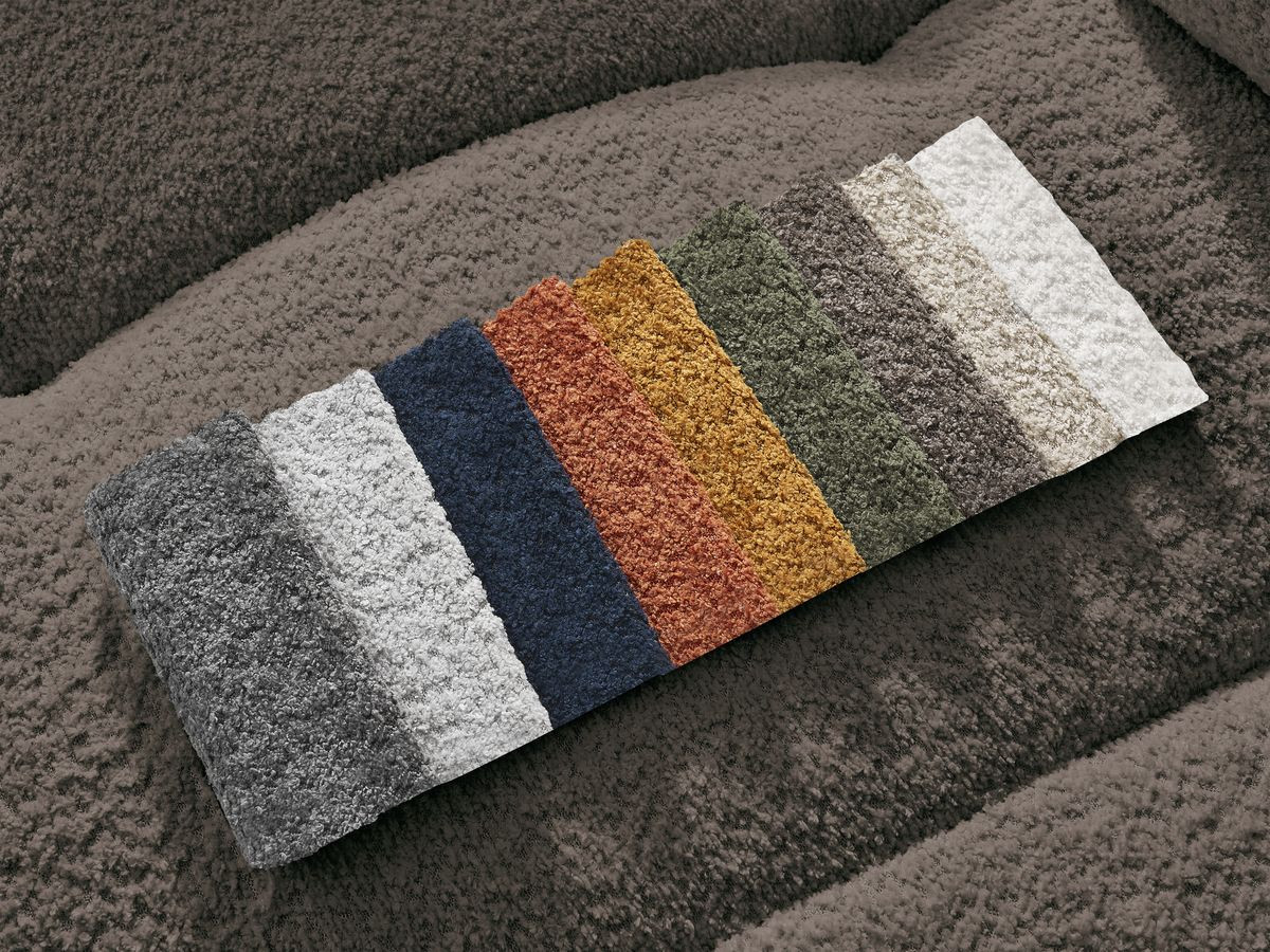 Canapé d'angle convertible coffre ROXELANE tissu bouclette avec pouf