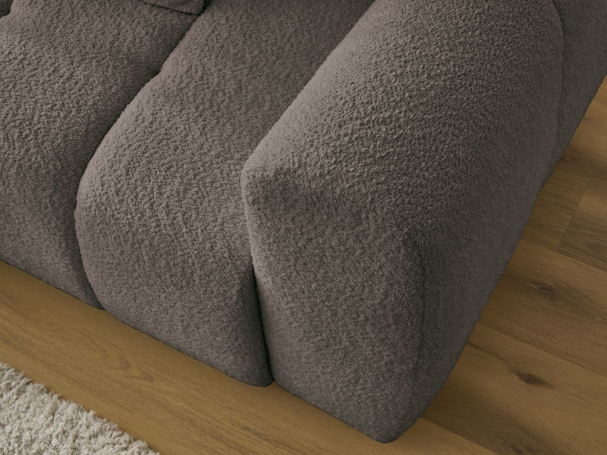 Canapé d'angle convertible coffre ROXELANE tissu bouclette avec pouf