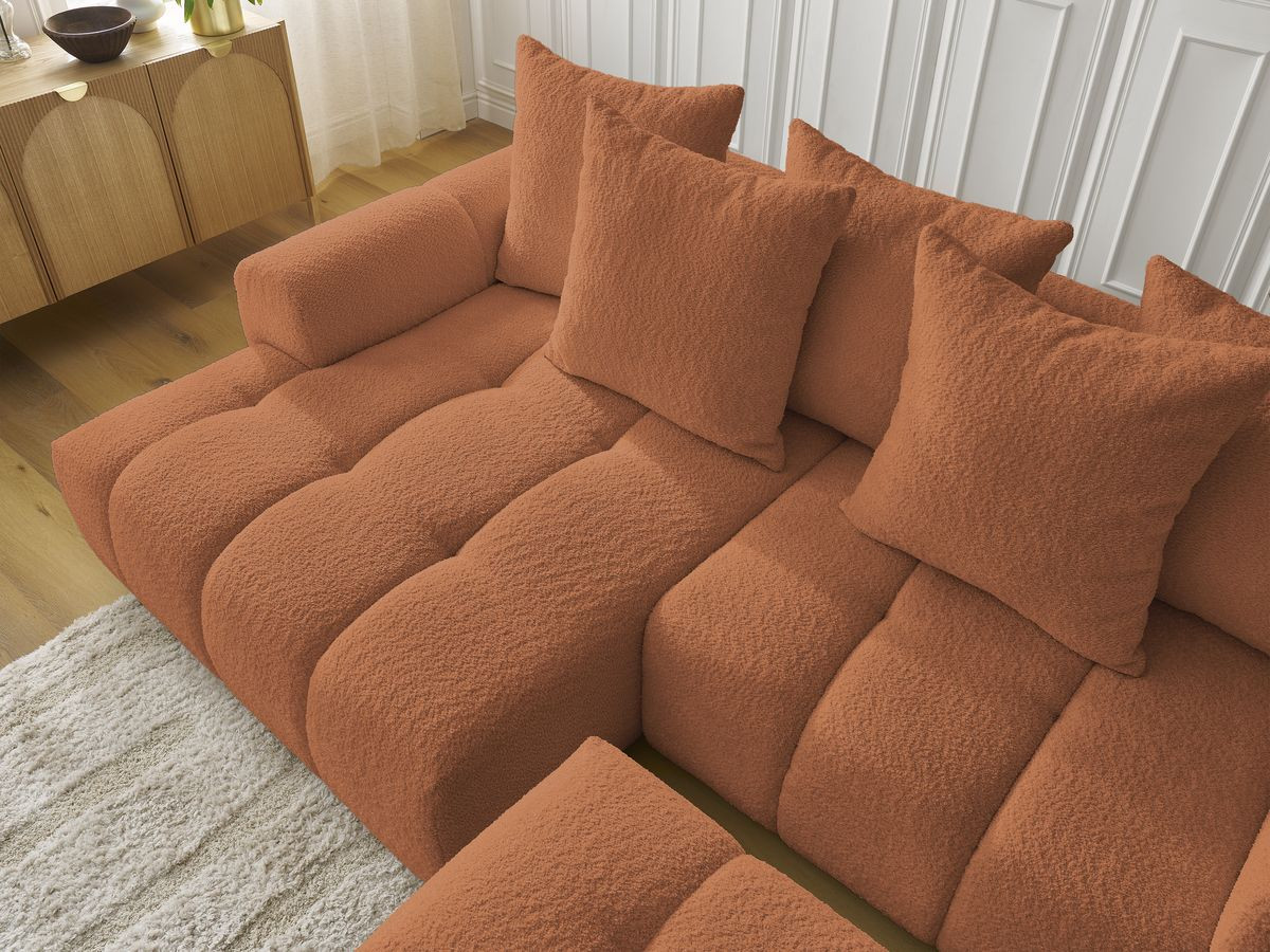 Canapé d'angle convertible coffre ROXELANE tissu bouclette avec pouf
