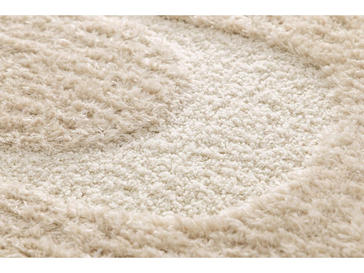 CALEB langpolig vloerkleed met grafisch patroon