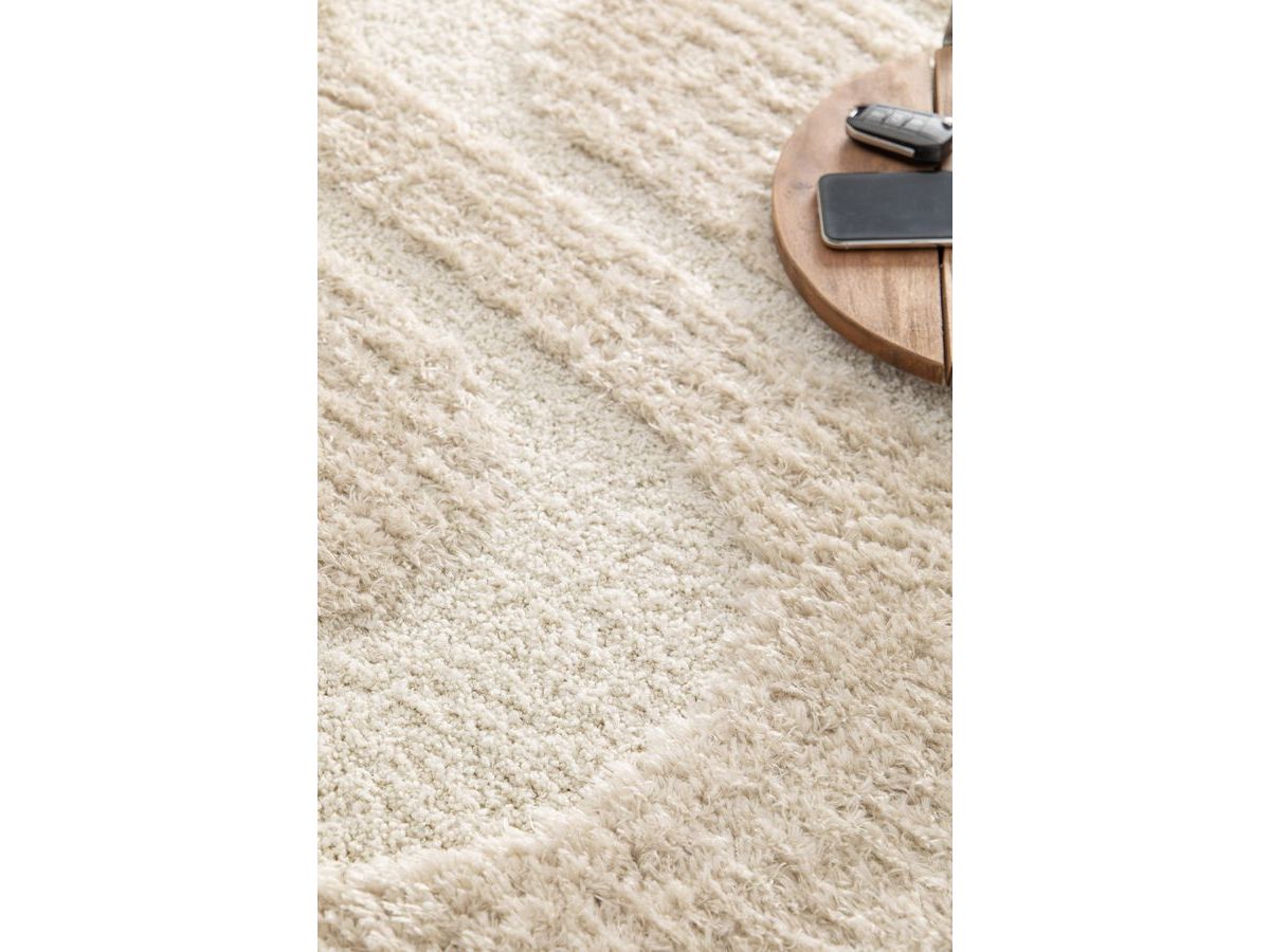 CALEB langpolig vloerkleed met grafisch patroon