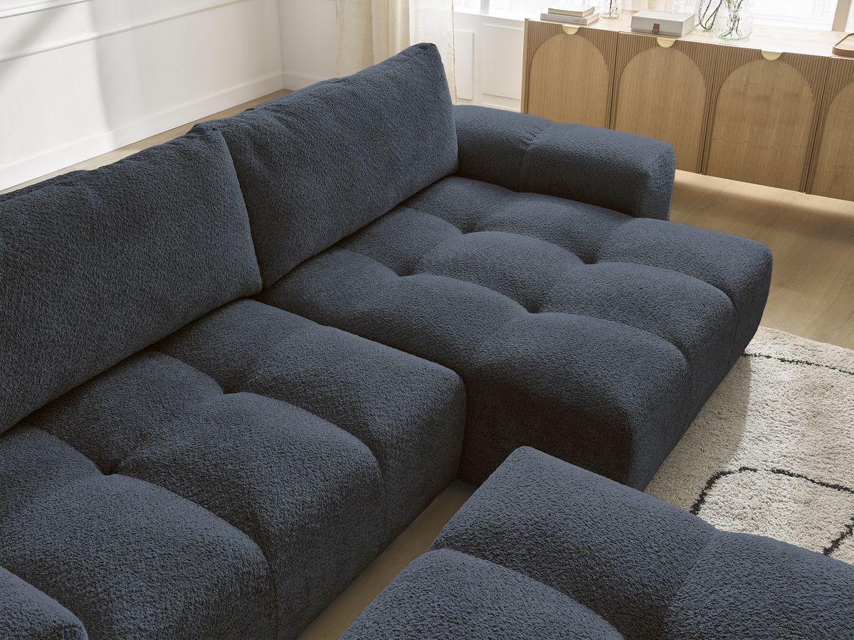 Canapé d'angle réversible ANAKIN tissu bouclette avec pouf
