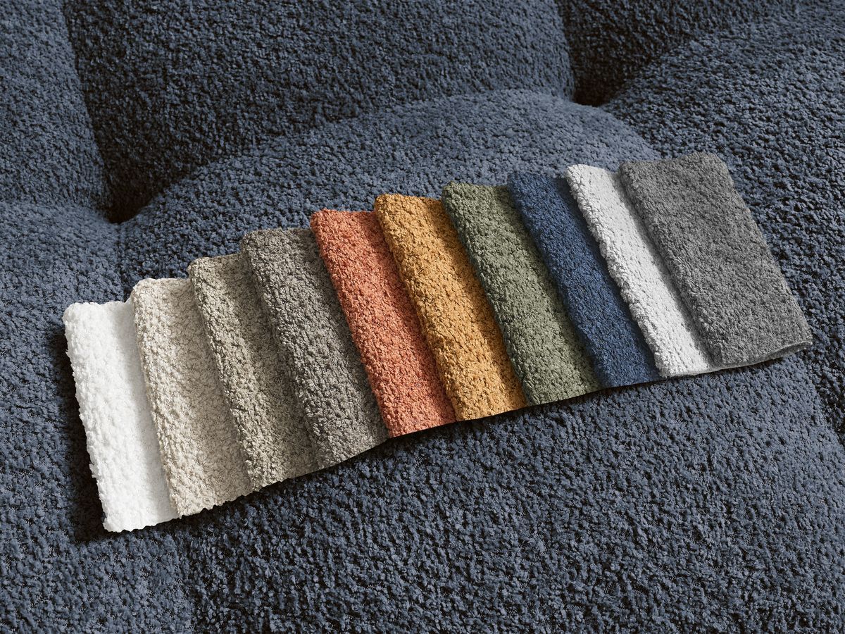 Canapé d'angle convertible réversible coffre ANAKIN tissu bouclette avec pouf