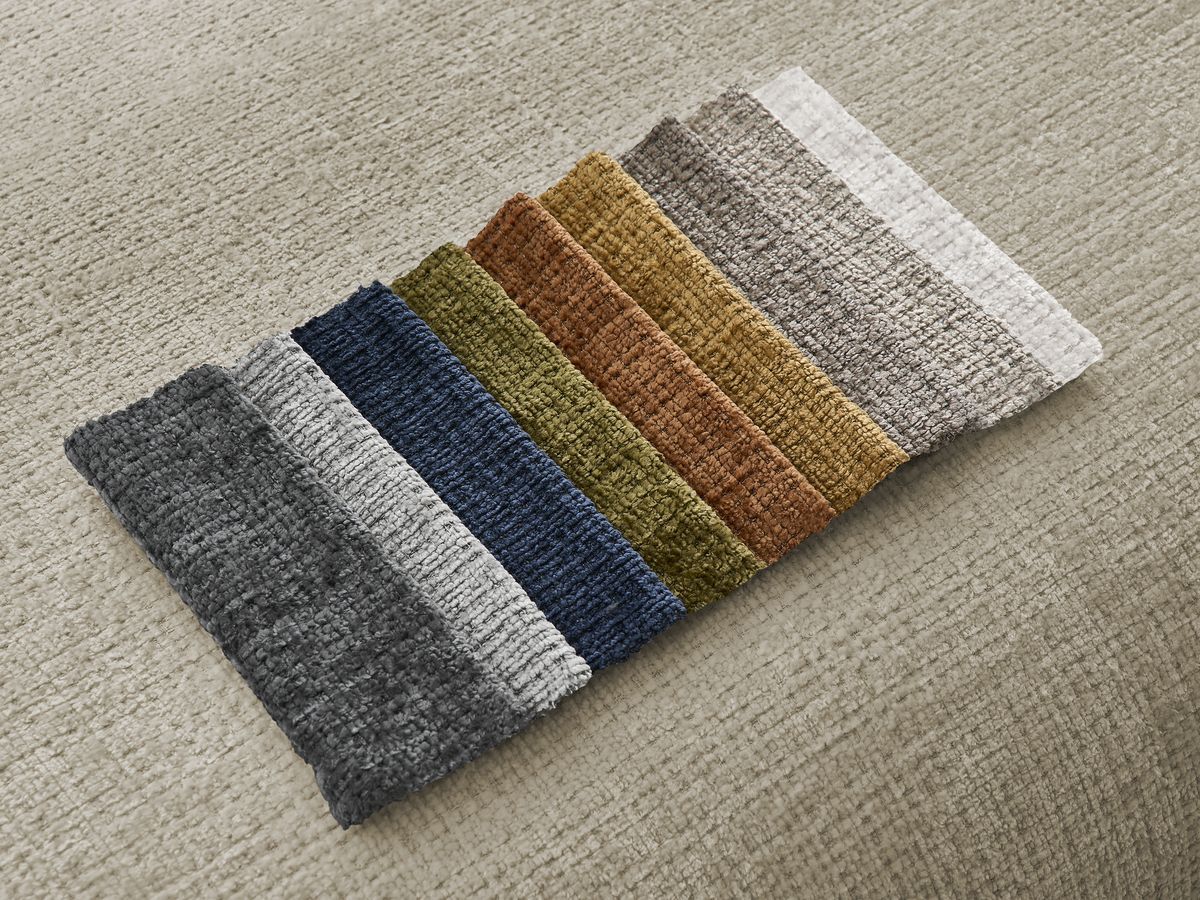 Canapé d'angle fixe modulable SIRIUS tissu texturé avec 1 chauffeuse et grand pouf