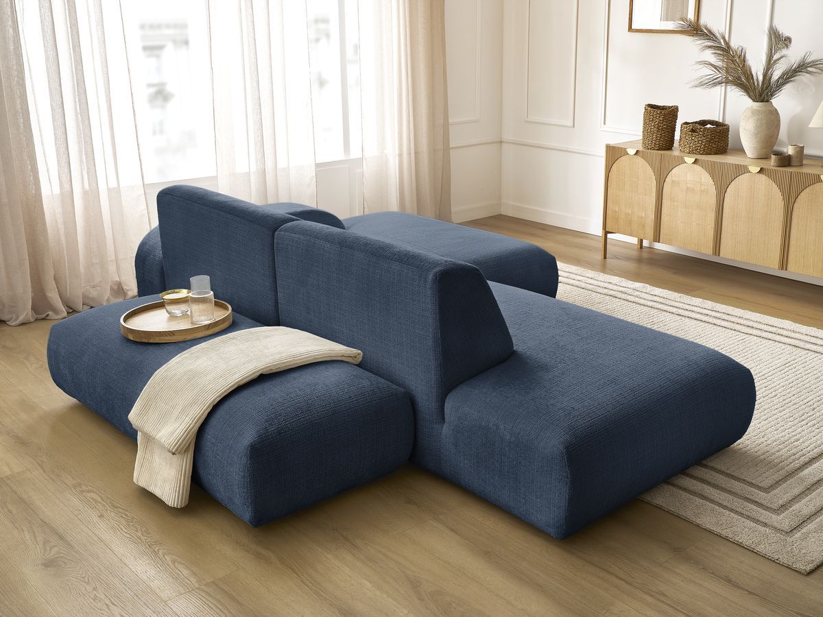 Canapé d'angle fixe modulable SIRIUS tissu texturé avec 1 chauffeuse et grand pouf