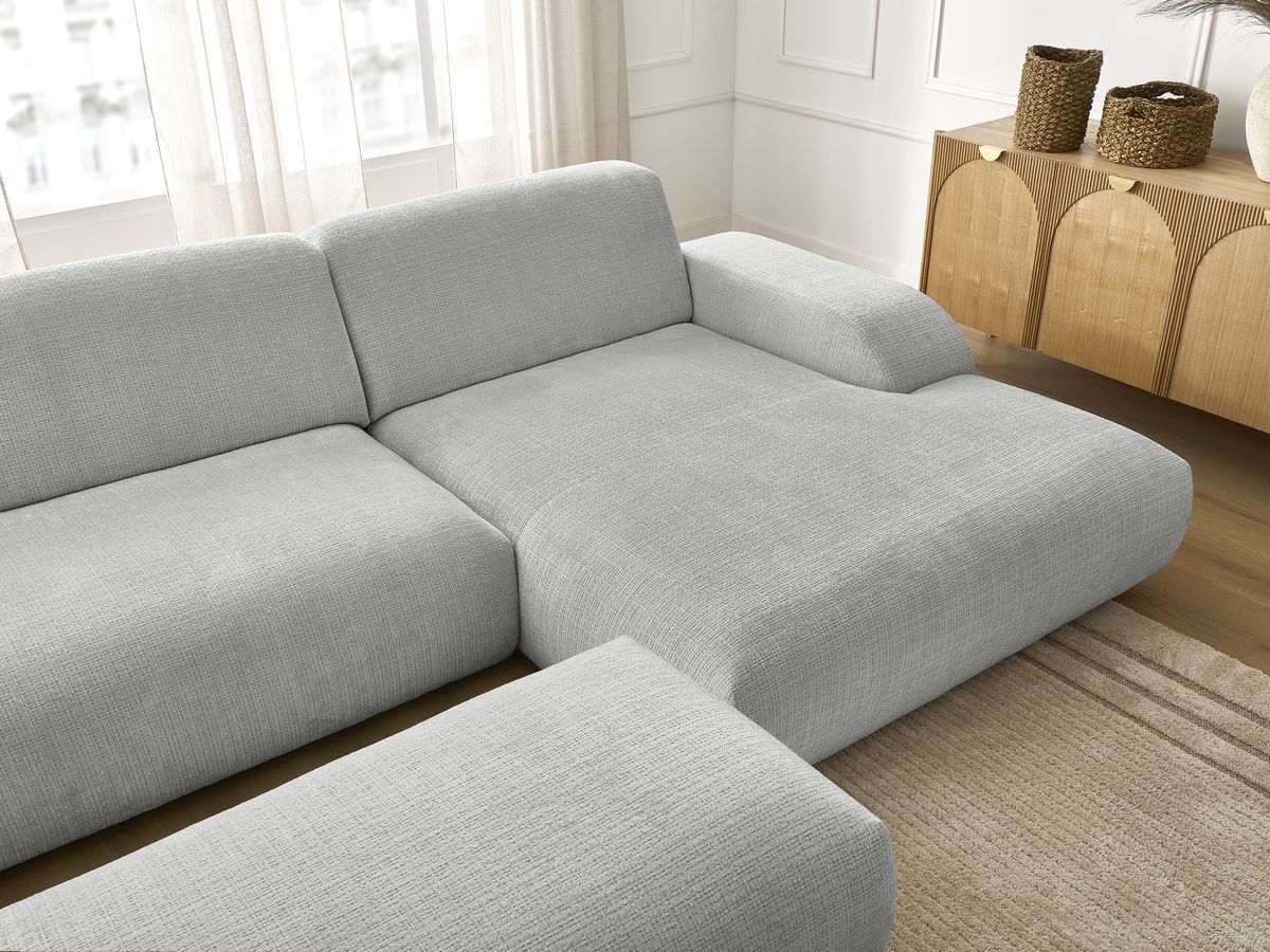 Canapé d'angle fixe modulable SIRIUS tissu texturé avec 1 chauffeuse et grand pouf