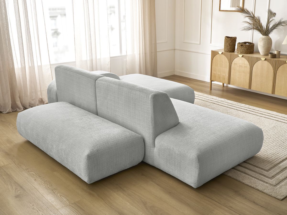 Canapé d'angle fixe modulable SIRIUS tissu texturé avec 1 chauffeuse et grand pouf