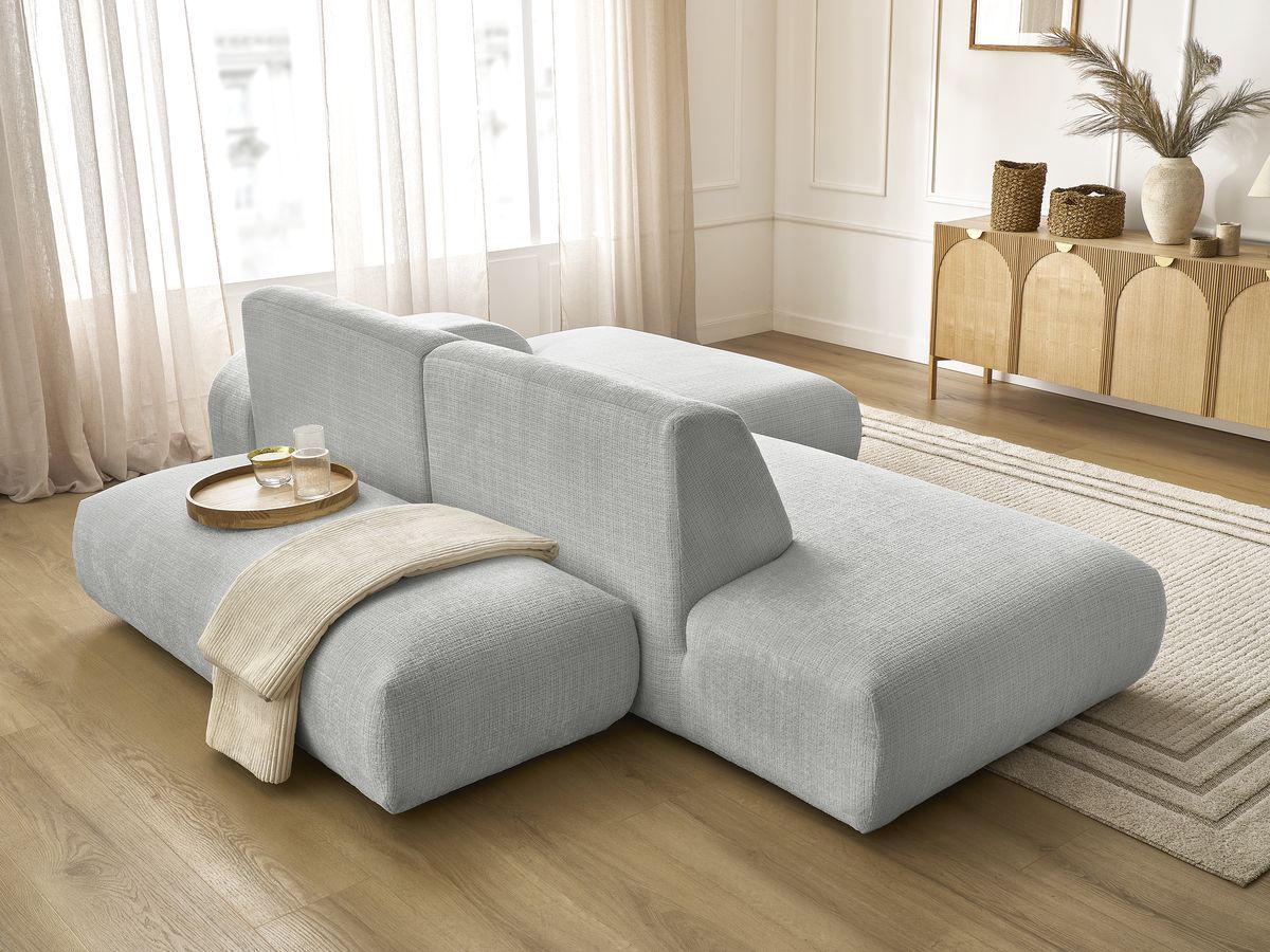 Canapé d'angle fixe modulable SIRIUS tissu texturé avec 1 chauffeuse et grand pouf