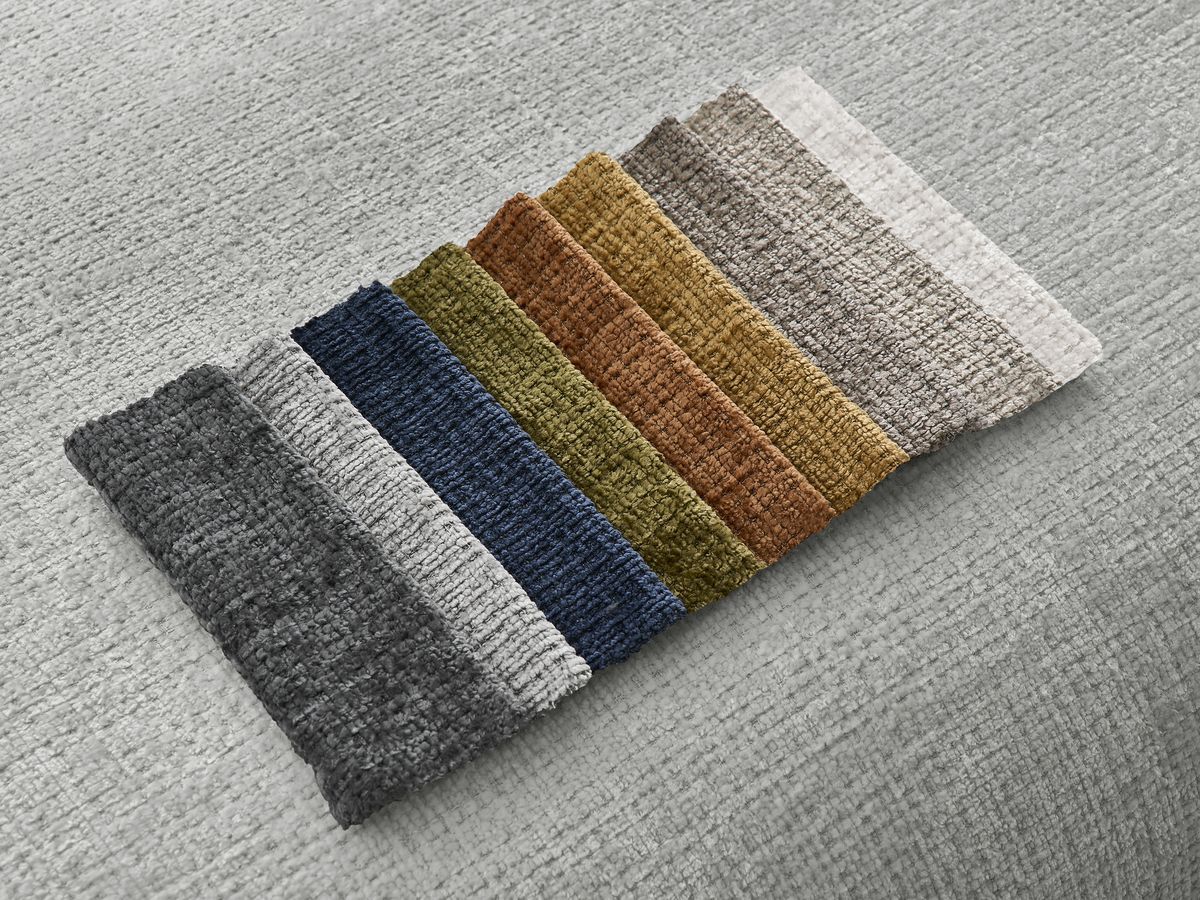 Canapé d'angle fixe modulable SIRIUS tissu texturé avec 1 chauffeuse et grand pouf
