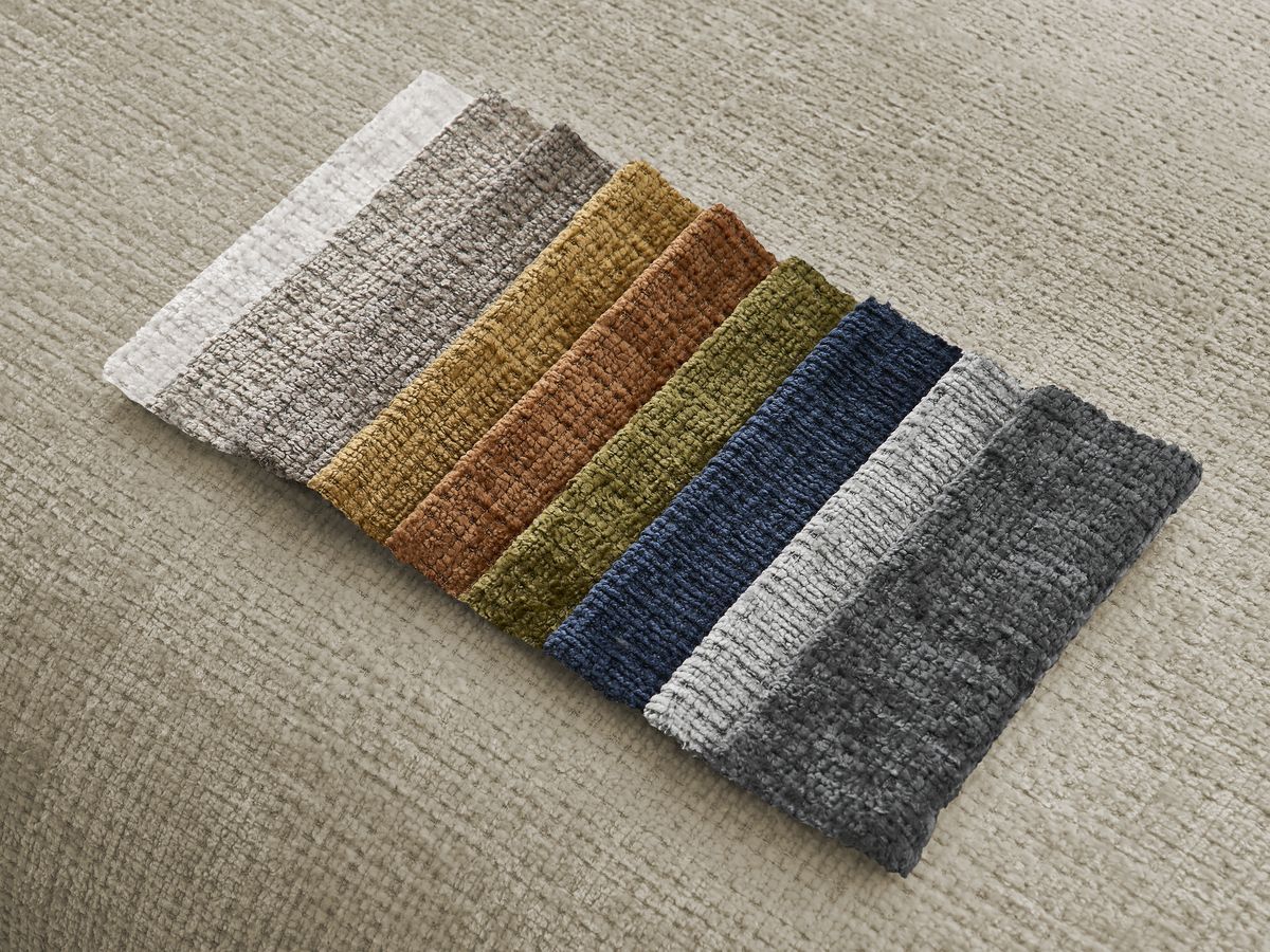 Canapé d'angle fixe modulable SIRIUS tissu texturé avec 1 chauffeuse et grand pouf
