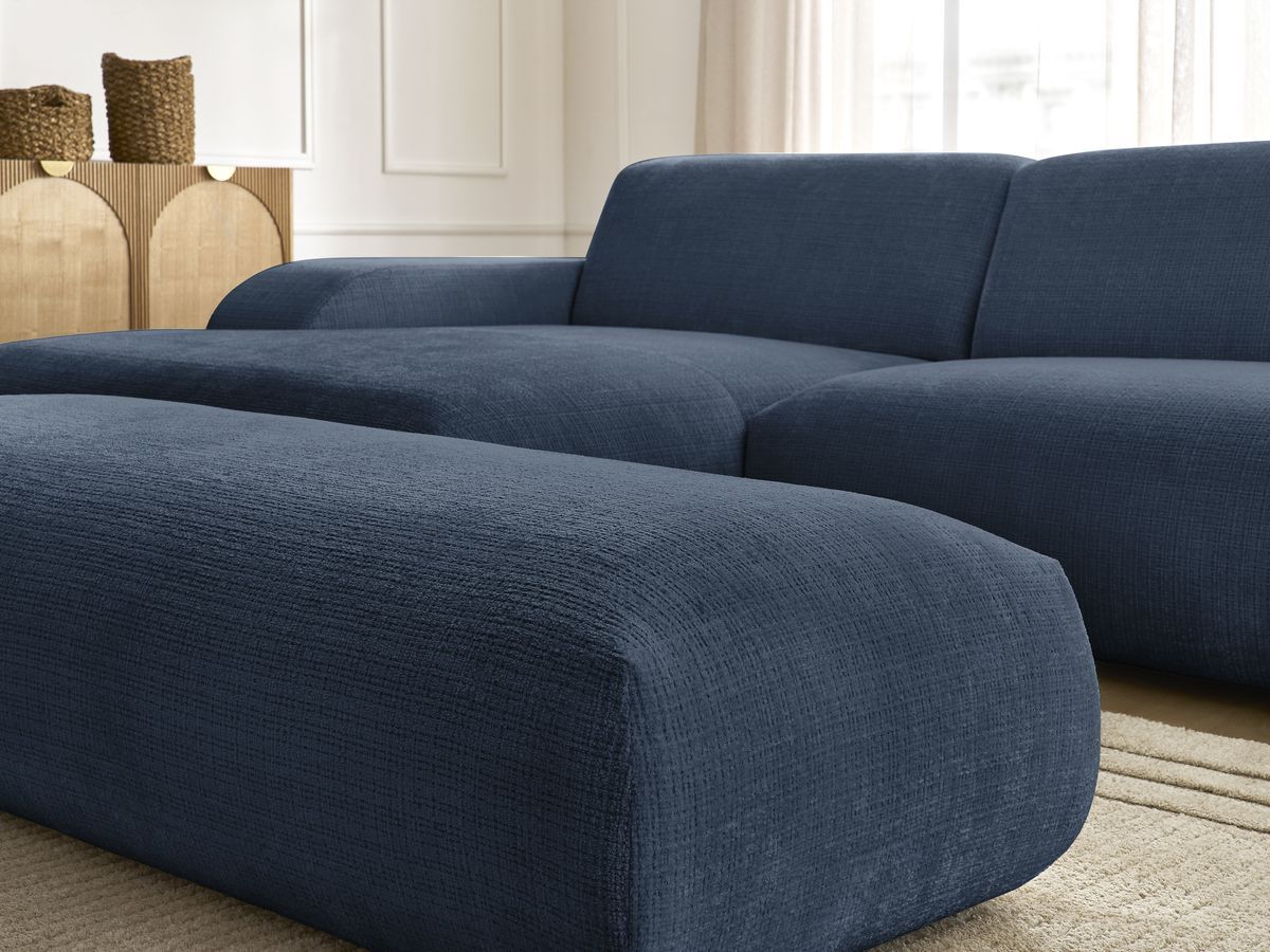 Canapé d'angle fixe modulable SIRIUS tissu texturé avec 1 chauffeuse et grand pouf
