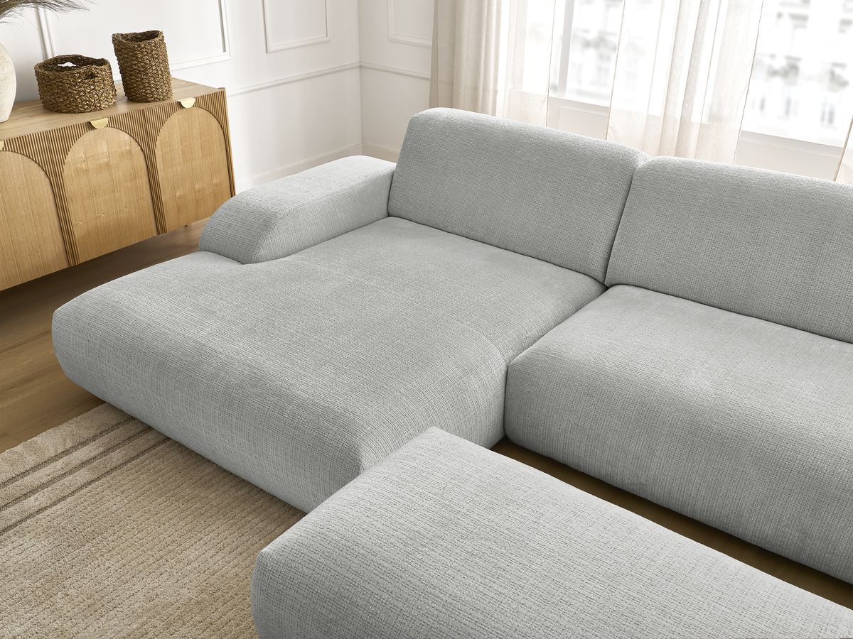 Canapé d'angle fixe modulable SIRIUS tissu texturé avec 1 chauffeuse et grand pouf