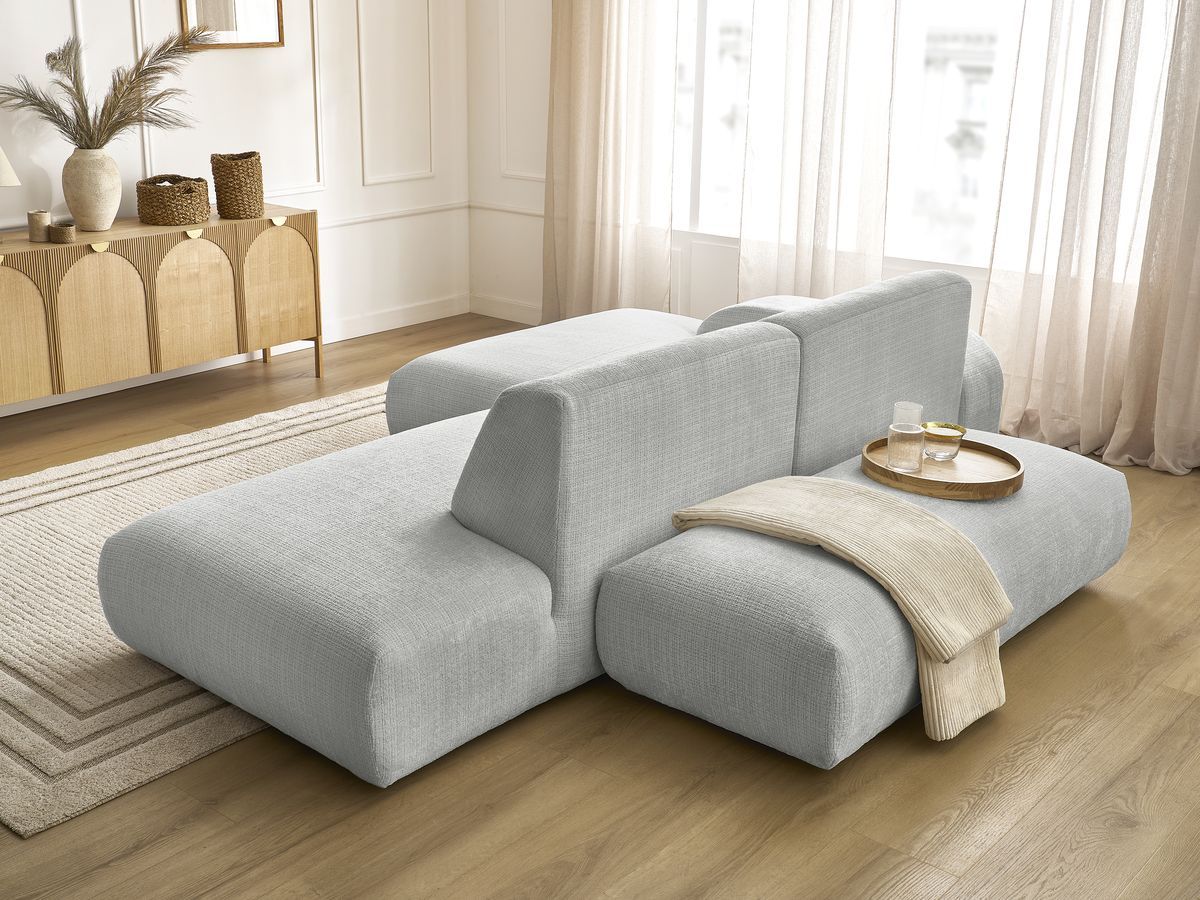 Canapé d'angle fixe modulable SIRIUS tissu texturé avec 1 chauffeuse et grand pouf
