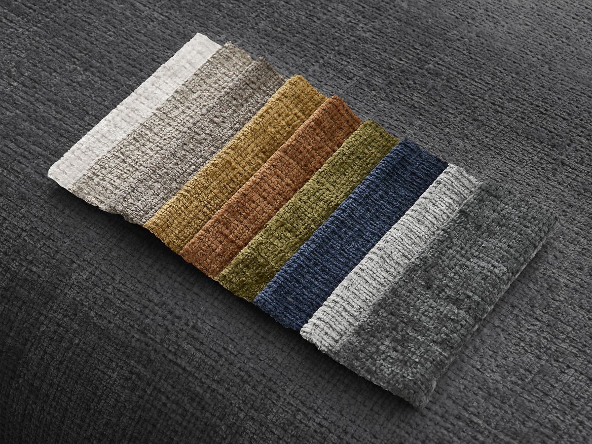 Canapé d'angle fixe modulable SIRIUS tissu texturé avec 1 chauffeuse et grand pouf