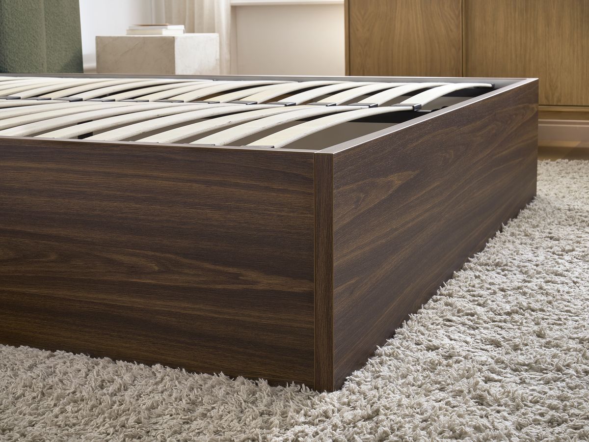 TIMO opbergbed in donker hout en badstof