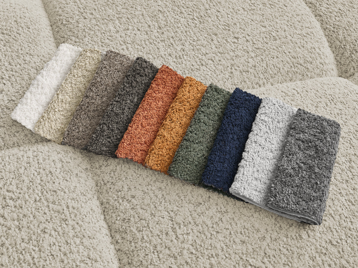 Canapé d'angle fixe ALYA tissu bouclette avec pouf