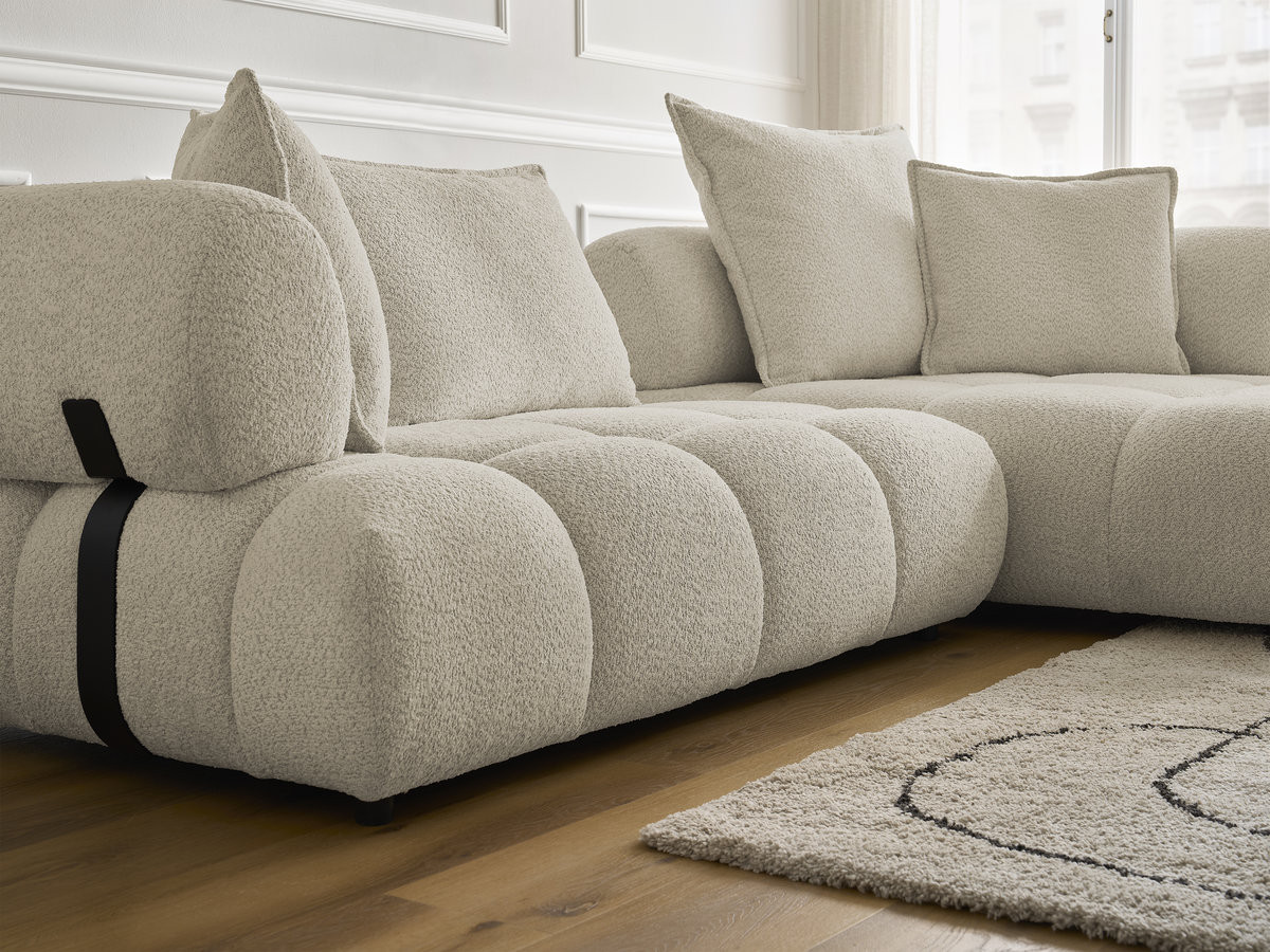 Canapé d'angle fixe ALYA tissu bouclette avec pouf