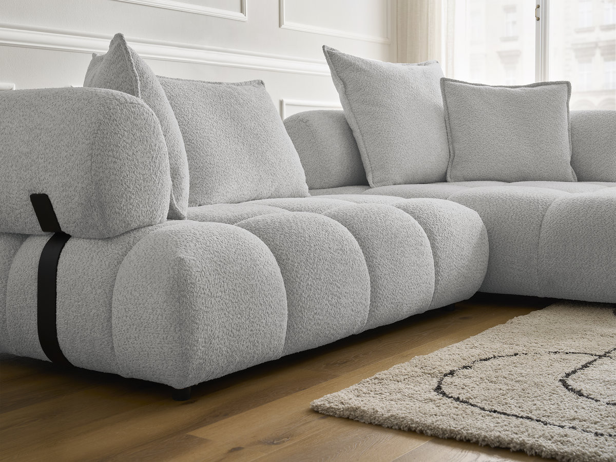 Canapé d'angle fixe ALYA tissu bouclette avec pouf