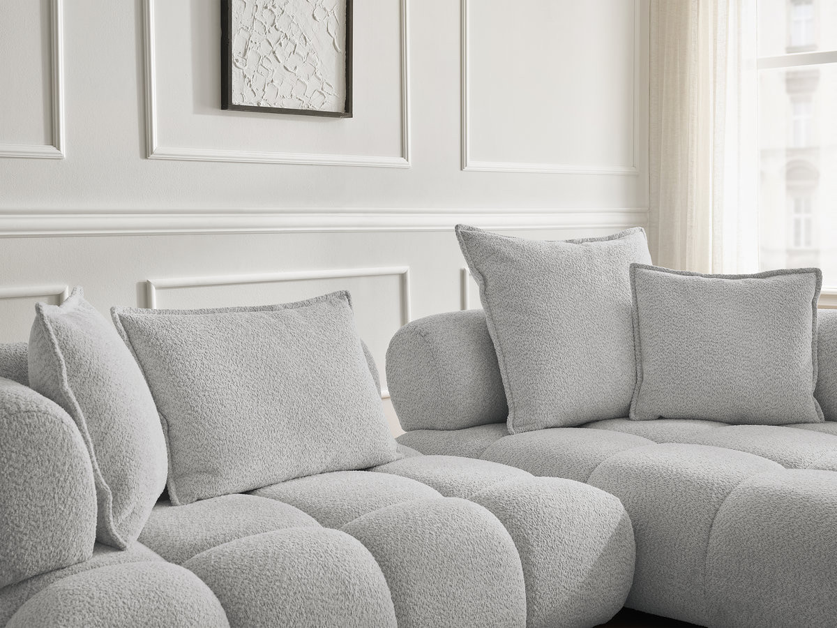 Canapé d'angle fixe ALYA tissu bouclette avec pouf