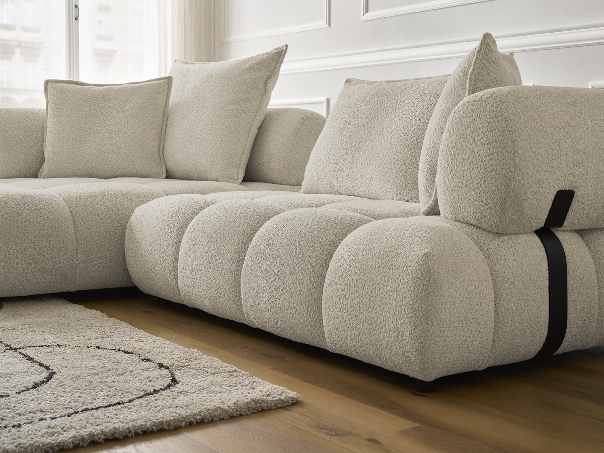 Canapé d'angle fixe ALYA tissu bouclette avec pouf