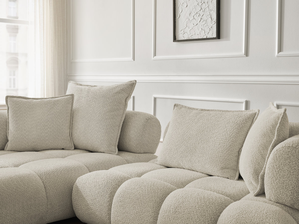 Canapé d'angle fixe ALYA tissu bouclette avec pouf