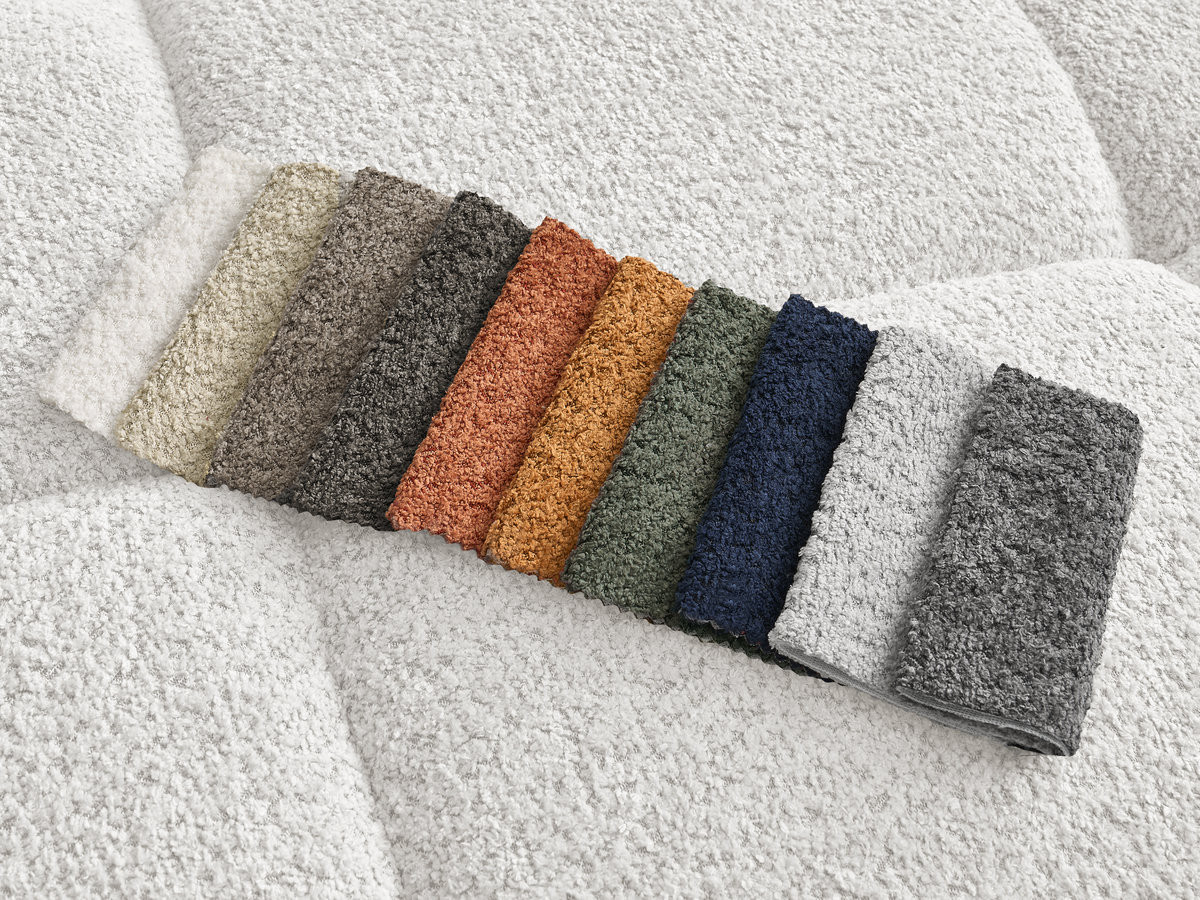 Canapé d'angle fixe ALYA tissu bouclette avec pouf