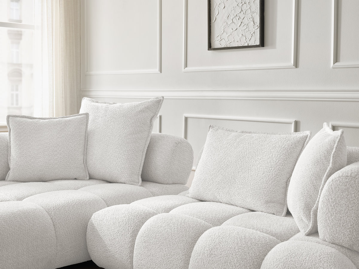 Canapé d'angle fixe ALYA tissu bouclette avec pouf