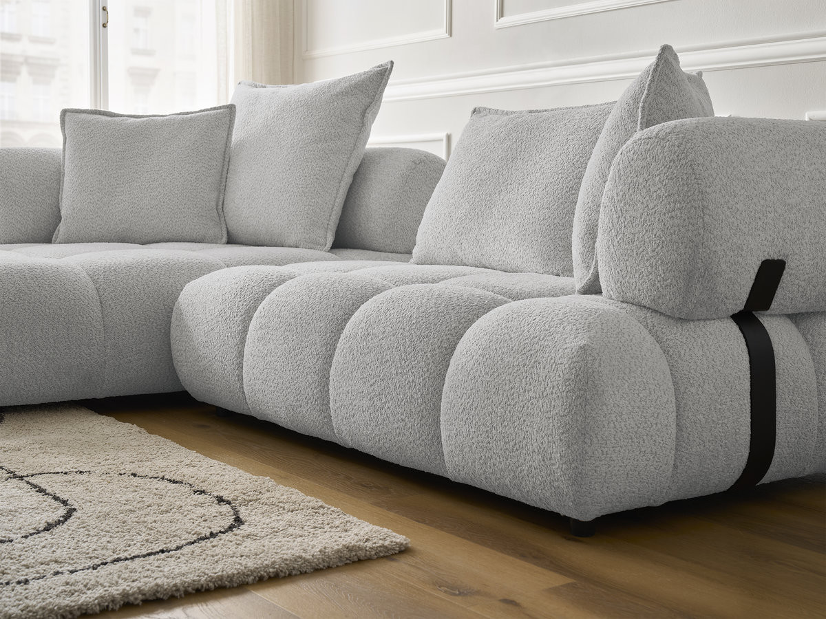 Canapé d'angle fixe ALYA tissu bouclette avec pouf