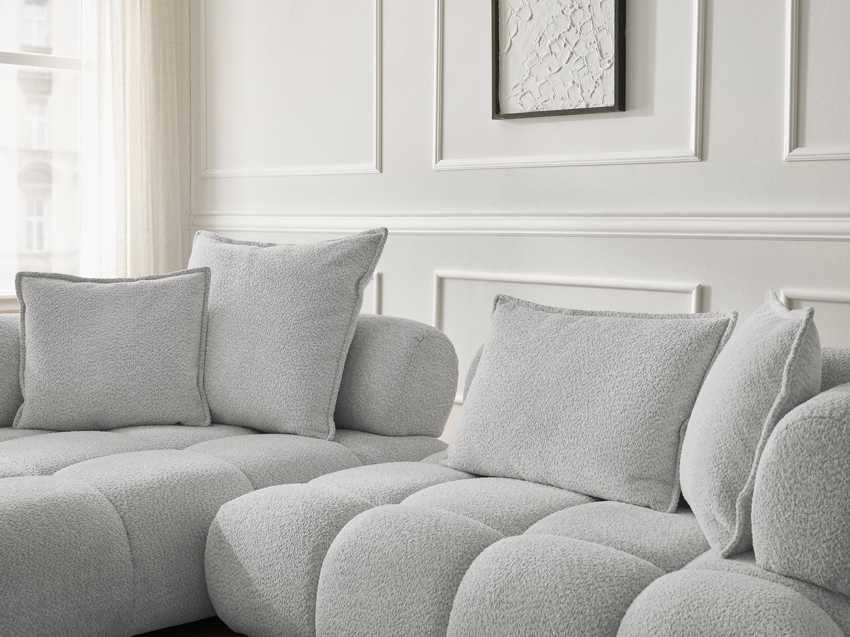 Canapé d'angle fixe ALYA tissu bouclette avec pouf
