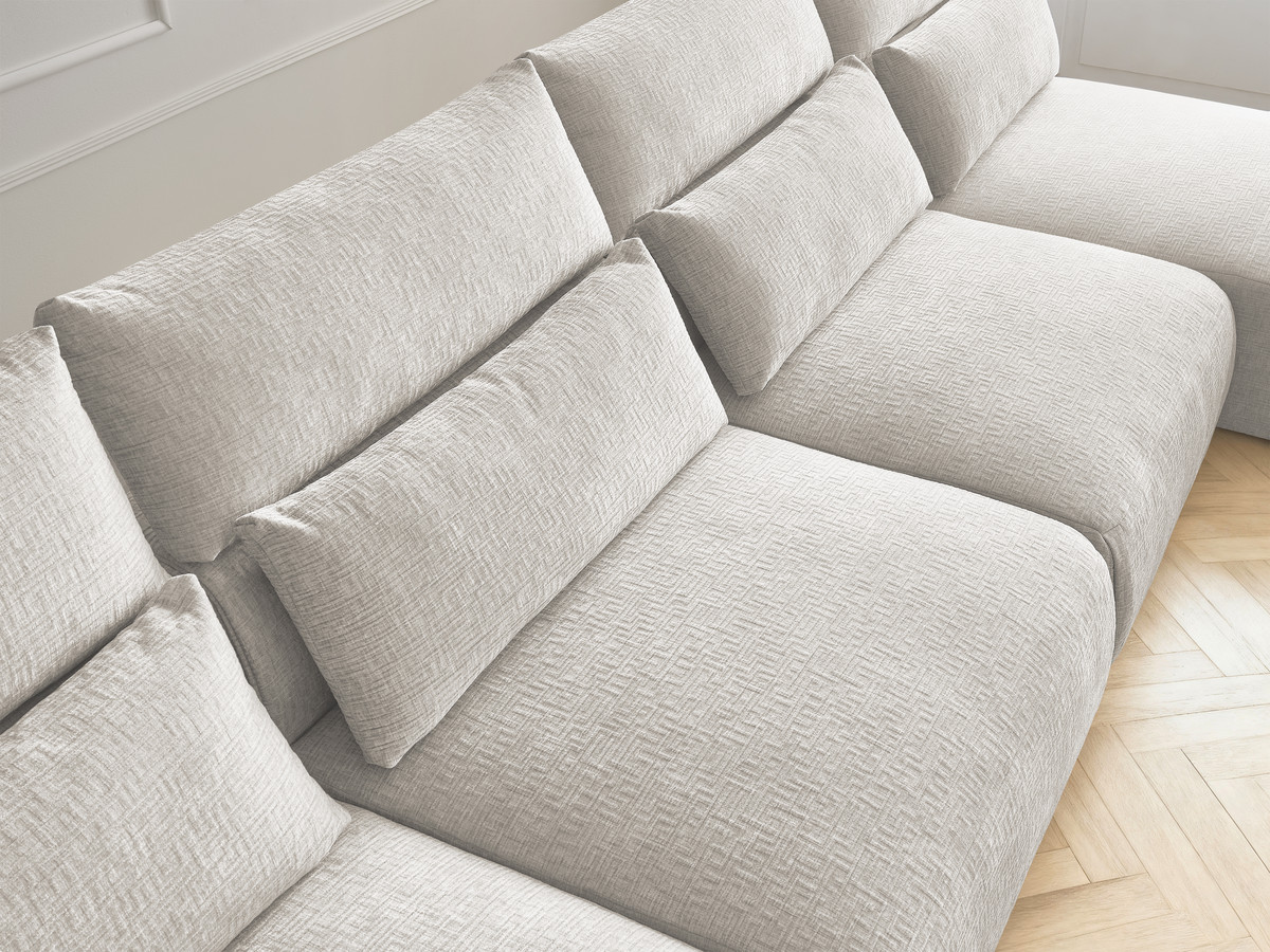 Modulaire vaste panoramabank met hoofdsteunen in JANA-stof met 2 chaise longues, 2 fauteuils en 1 grote poef