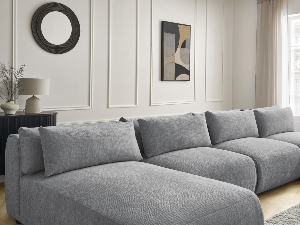 Modulaire vaste panoramabank met hoofdsteunen in JANA-stof met 2 chaise longues, 2 fauteuils en 1 kleine poef