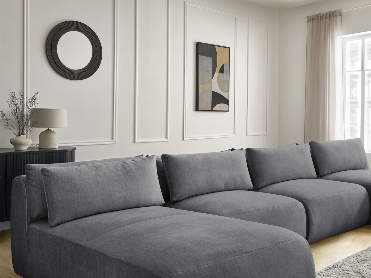 Modulaire vaste panoramabank met hoofdsteunen in JANA fluwelen stof met 2 chaise longues, 2 fauteuils en 1 kleine poef