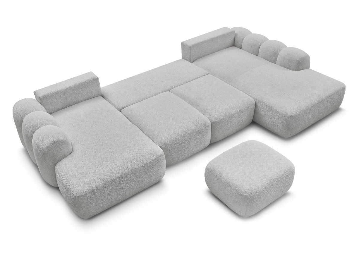 MONTAIGNE panoramische slaapbank met opbergruimte, bouclé stof en voetenbank.