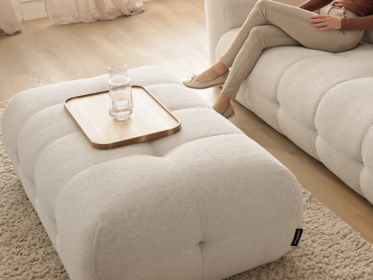 LAURA vaste hoekbank in gemêleerde stof met grote voetenbank