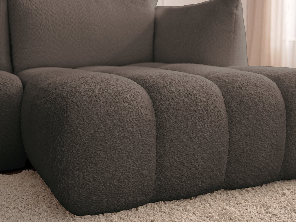 Canapé d'angle fixe modulable AZRA tissu bouclette avec pouf