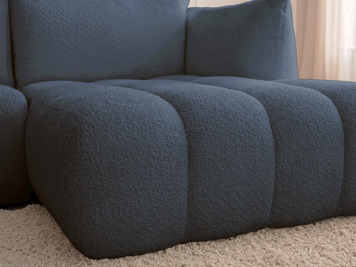 Canapé d'angle fixe modulable AZRA tissu bouclette avec pouf