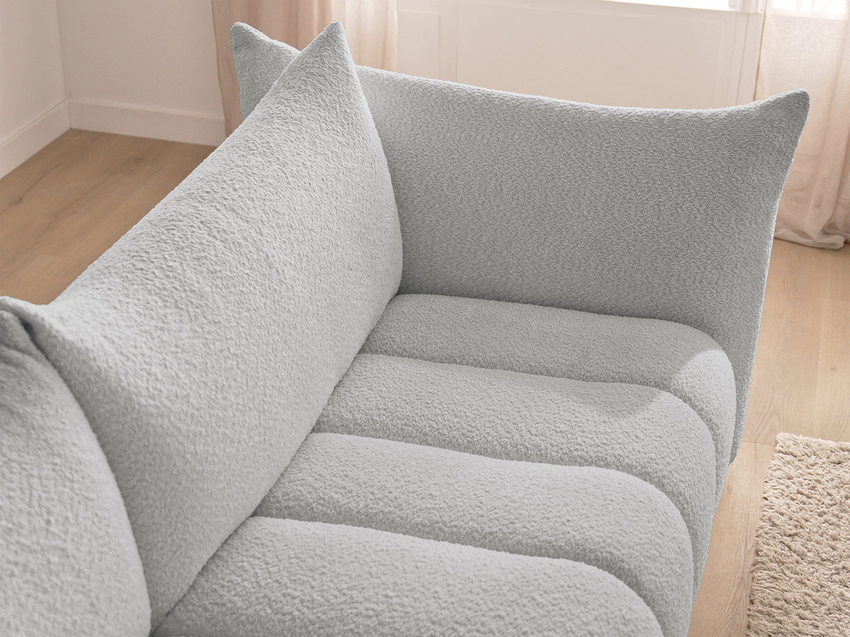 Canapé d'angle fixe modulable AZRA tissu bouclette avec pouf