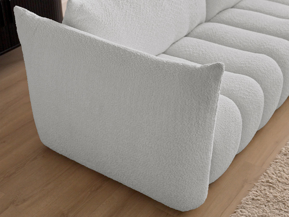 Canapé d'angle fixe modulable AZRA tissu bouclette avec pouf