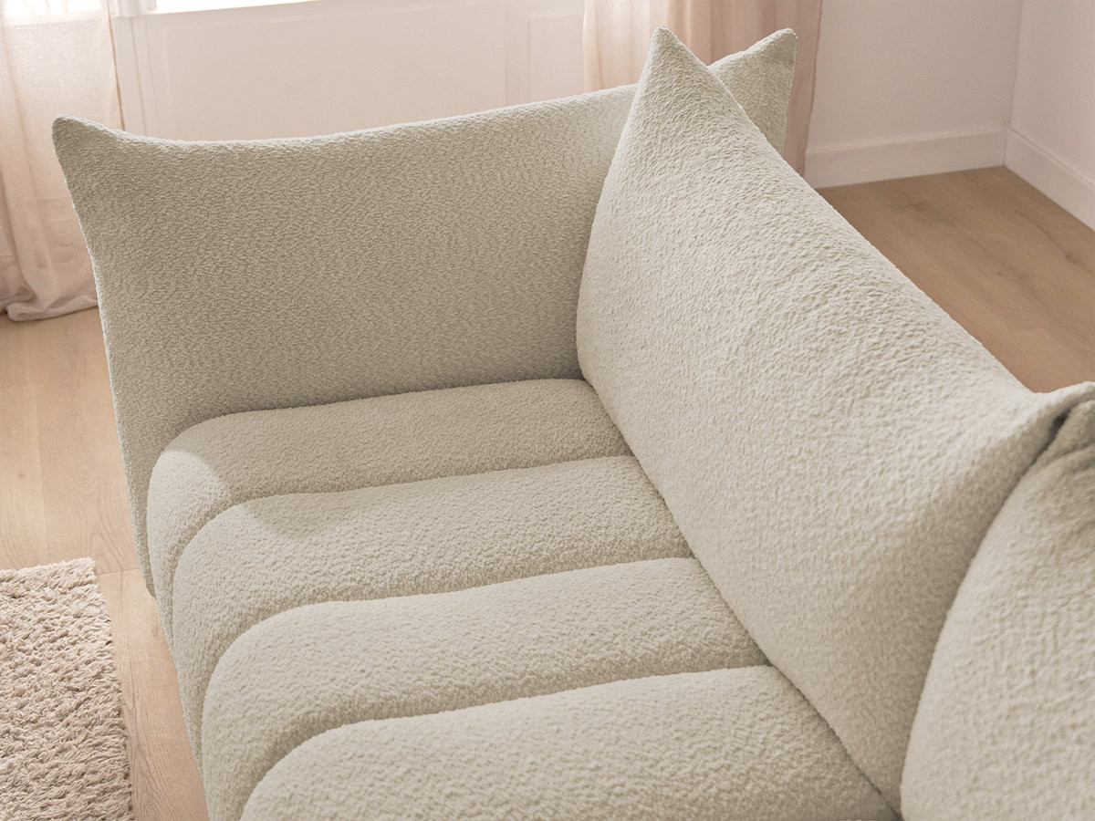 Canapé d'angle fixe modulable AZRA tissu bouclette avec pouf