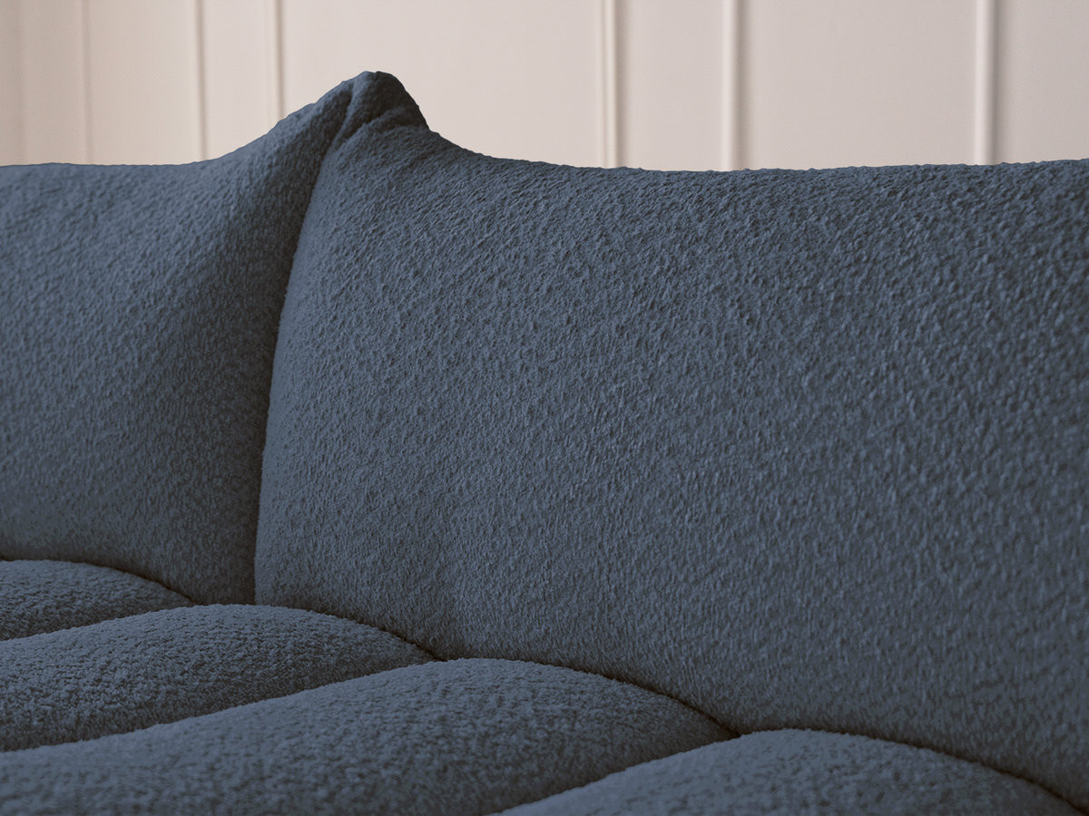 Canapé d'angle fixe modulable AZRA tissu bouclette avec pouf