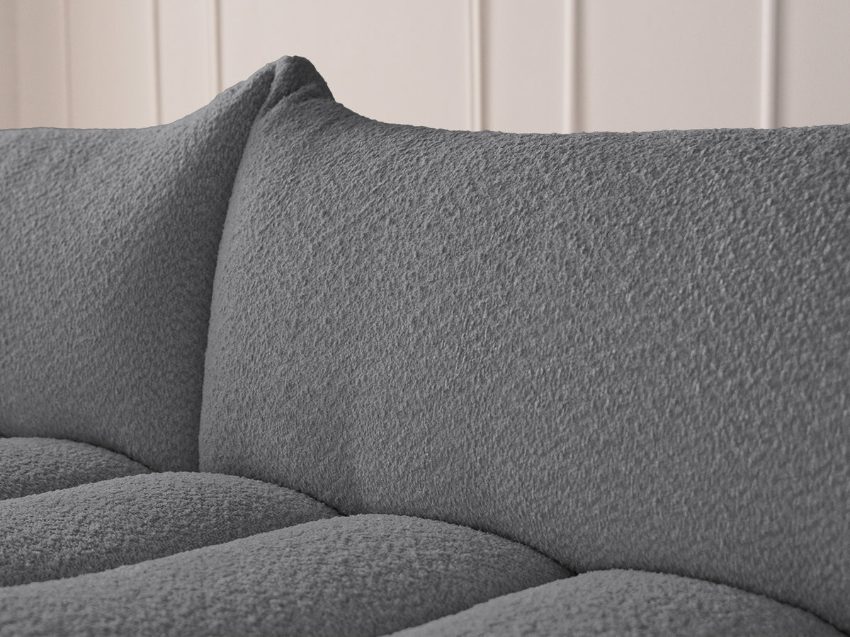 Canapé d'angle fixe modulable AZRA tissu bouclette avec pouf