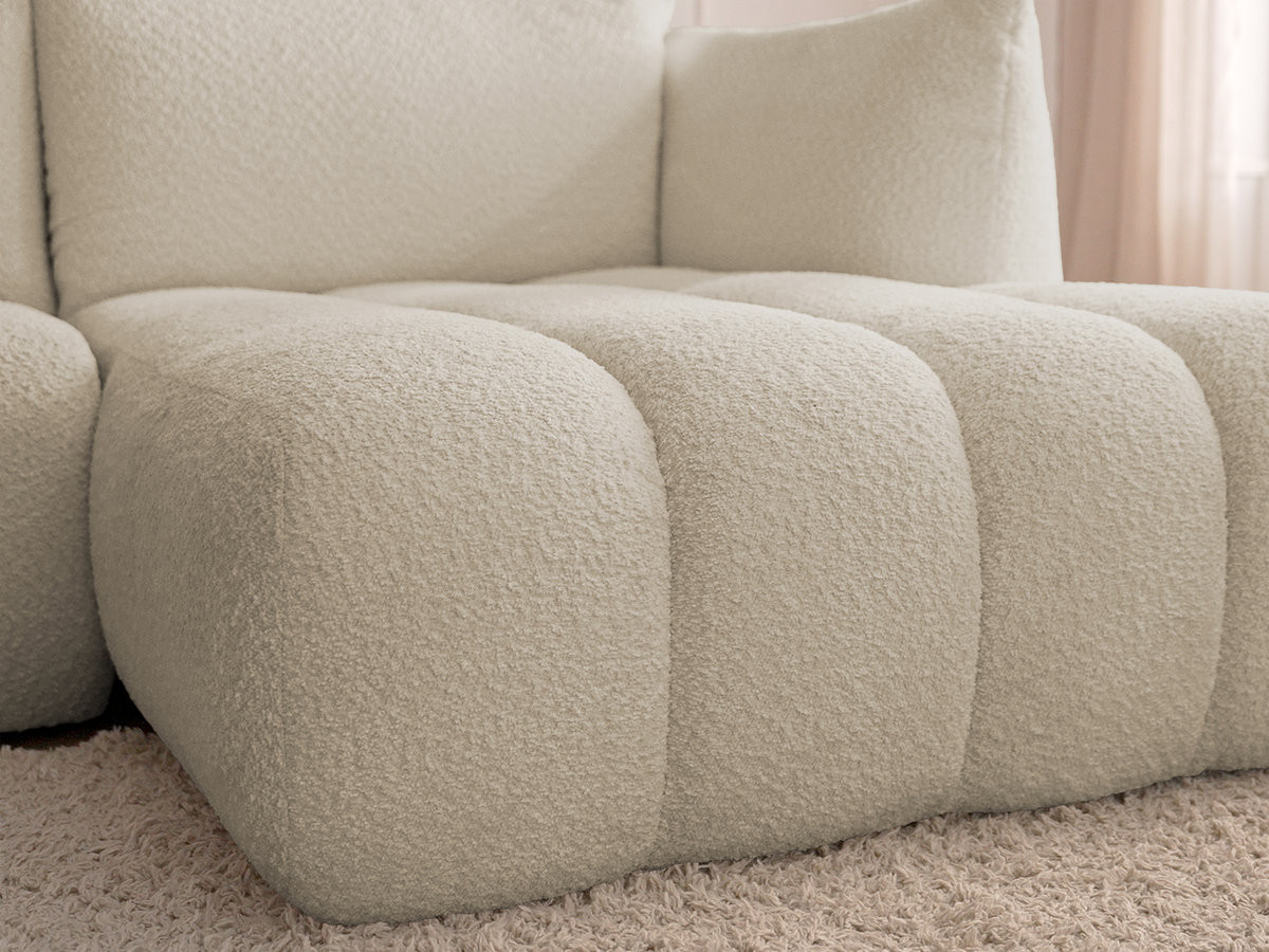 Canapé d'angle fixe AZRA tissu bouclette avec pouf