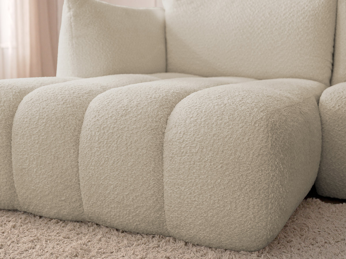 Canapé d'angle fixe AZRA tissu bouclette avec pouf