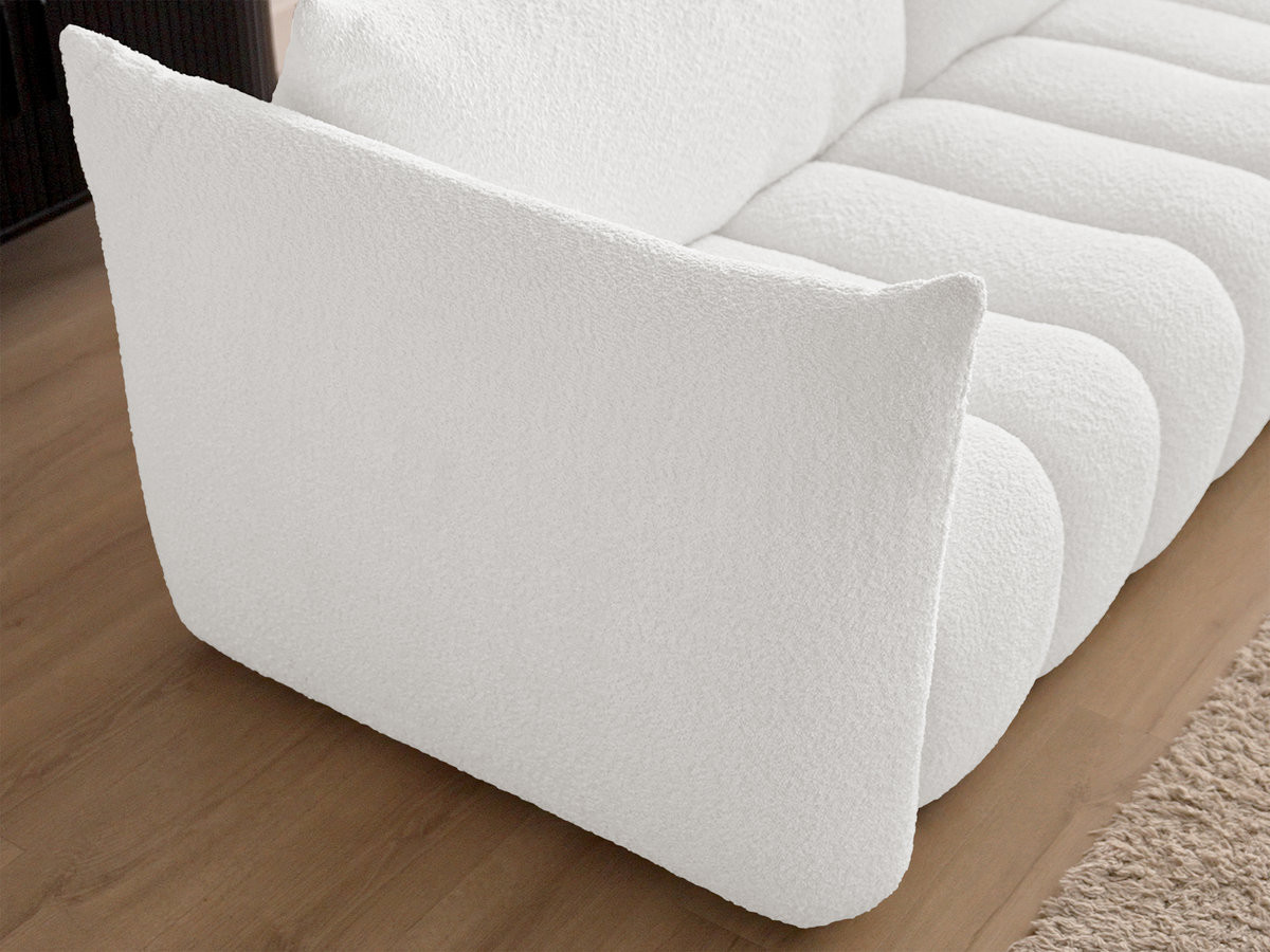 Canapé droit fixe 4 places AZRA tissu bouclette avec pouf