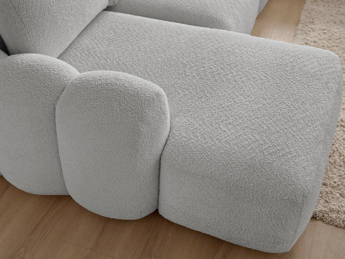 Canapé d'angle convertible coffre grande méridienne MONTAIGNE tissu bouclette avec pouf