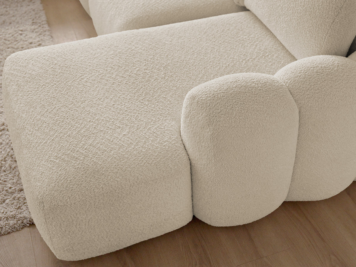 Canapé d'angle convertible coffre MONTAIGNE tissu bouclette avec pouf